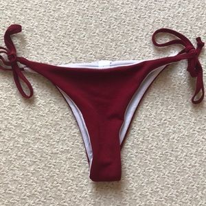 Thong bikini bottoms.